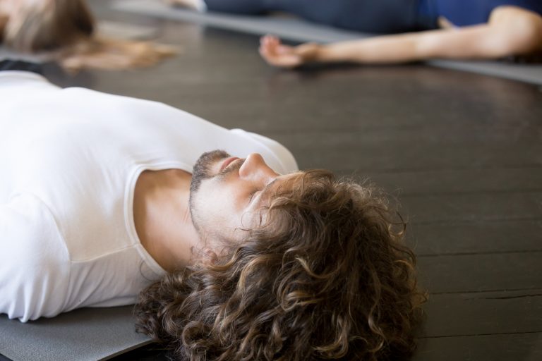Close up of male head, Savasana pose